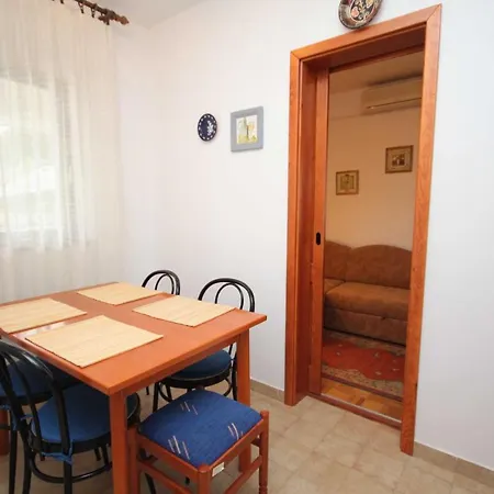 Apartments And Rooms With Parking Space Krk - 3231